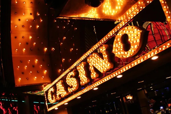 Live dealer roulette studio with table display and dealer camera